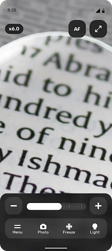 Perfect Magnifier app displaying magnified text at 6.0x zoom with AF focus, crop tools, and zoom controls interface