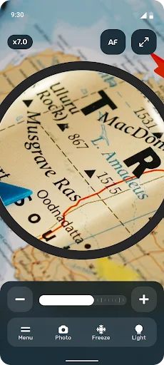Perfect Magnifier map magnification at 7.0x zoom showing place names through circular magnifying glass feature